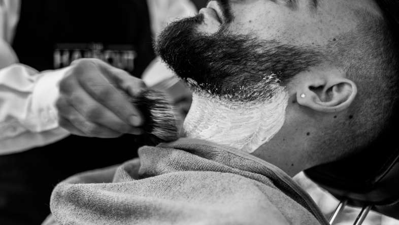 man shaving at barber